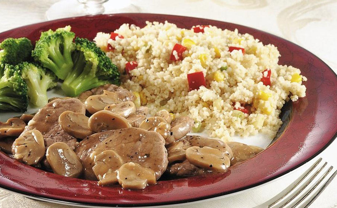 SAUCY PORK MEDALLIONS WITH SPICED COUSCOUS